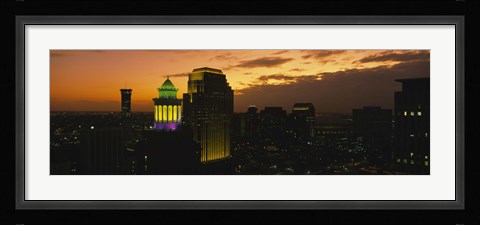 Framed High angle view of buildings lit up at dusk, New Orleans, Louisiana, USA Print
