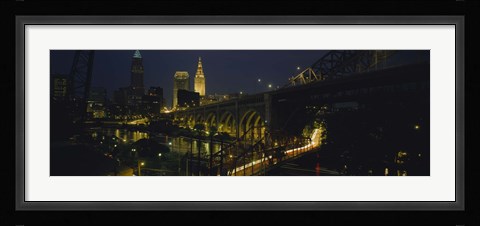 Framed Arch bridge and buildings lit up at night, Cleveland, Ohio, USA Print