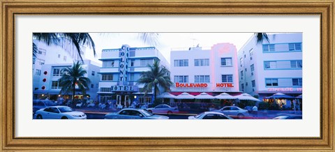 Framed Traffic on road in front of hotels, Ocean Drive, Miami, Florida, USA Print