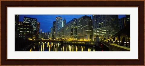 Framed Low angle view of buildings lit up at night, Chicago River, Chicago, Illinois, USA Print