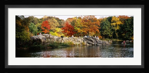Framed Group of people sitting on rocks, Central Park, Manhattan, New York City, New York, USA Print