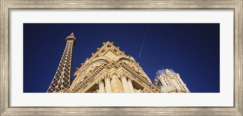 Framed Low angle view of a building in front of a replica of the Eiffel Tower, Paris Hotel, Las Vegas, Nevada, USA Print