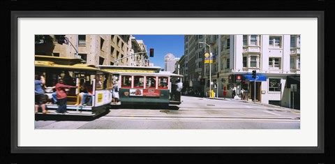 Framed Two cable cars on a road, Downtown, San Francisco, California, USA Print
