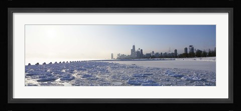 Framed Frozen lake with a city in the background, Lake Michigan, Chicago, Illinois Print