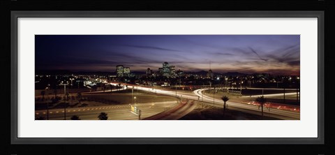 Framed Buildings in a city lit up at dusk, 7th St. Freeway, Phoenix, Maricopa County, Arizona, USA Print