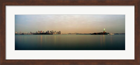 Framed River with the city skyline and Statue of Liberty in the background, New York Harbor, New York City, New York State, USA Print
