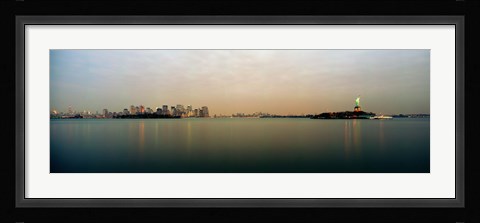 Framed River with the city skyline and Statue of Liberty in the background, New York Harbor, New York City, New York State, USA Print