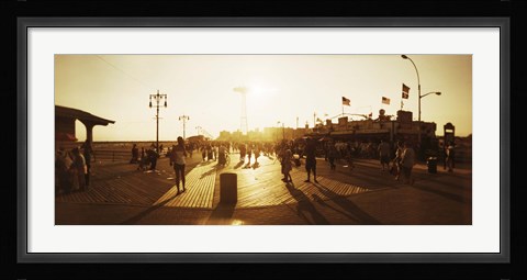 Framed Tourists walking on a boardwalk, Coney Island Boardwalk, Coney Island, Brooklyn, New York City, New York State, USA Print