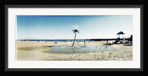 Framed Palm tree sprinkler on the beach, Coney Island, Brooklyn, New York City, New York State, USA Print