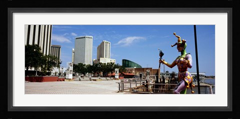 Framed Jester statue with buildings in the background, Riverwalk Area, New Orleans, Louisiana, USA Print