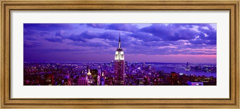 Framed Empire State Building lit up in white, Midtown Manhattan, New York City Print