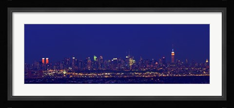 Framed Buildings in a city lit up at night, Upper Manhattan, Manhattan, New York City, New York State, USA Print