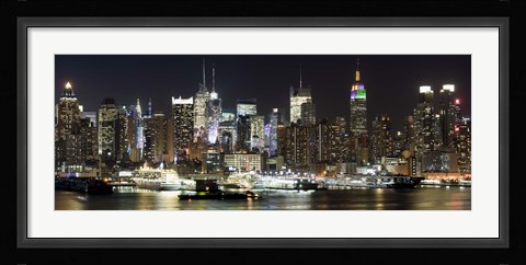 Framed Buildings in a city lit up at night, Hudson River, Midtown Manhattan, Manhattan, New York City, New York State, USA Print