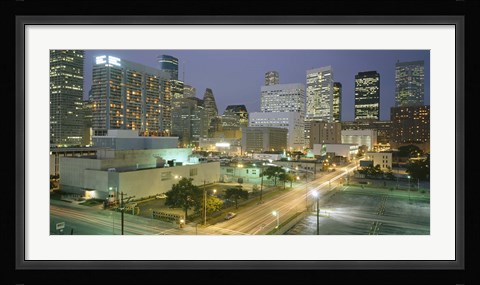 Framed Skyscrapers lit up at night, Houston, Texas Print