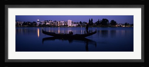 Framed Boat in a lake with city in the background, Lake Merritt, Oakland, Alameda County, California, USA Print