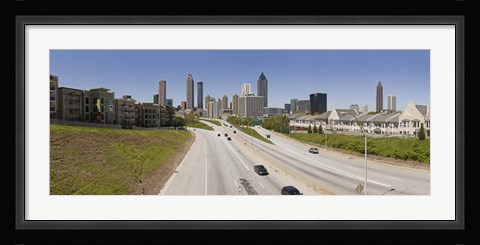 Framed Vehicles moving on the road leading towards the city, Atlanta, Georgia, USA Print