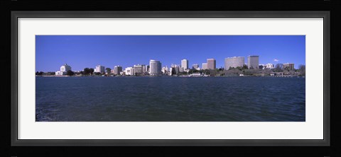 Framed Skyscrapers along a lake, Lake Merritt, Oakland, California, USA Print