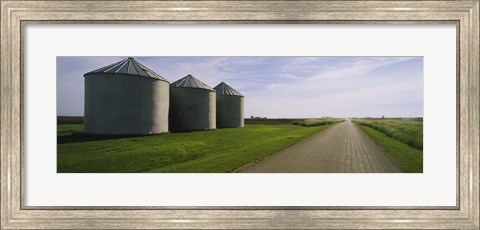 Framed Three silos in a field Print