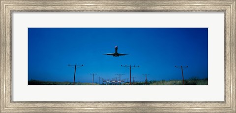 Framed Airplane landing Philadelphia International Airport PA USA Print