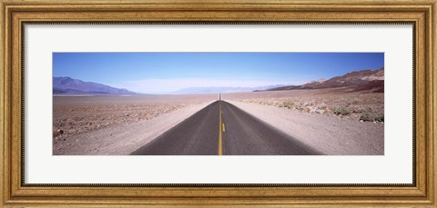 Framed USA, California, Death Valley, Empty highway in the valley Print
