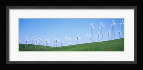 Framed Wind turbines spinning on hills, Altamont Pass, Livermore, California, USA Print