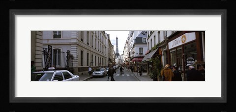 Framed Buildings along a street with a tower in the background, Rue Saint Dominique, Eiffel Tower, Paris, Ile-de-France, France Print