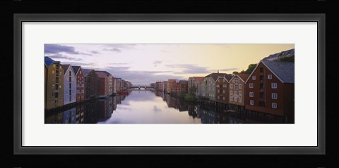 Framed Houses on both sides of a river, Trondheim, Sor-Trondelag, Norway Print