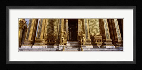 Framed Low angle view of statues in front of a temple, Phra Mondop, Grand Palace, Bangkok, Thailand Print