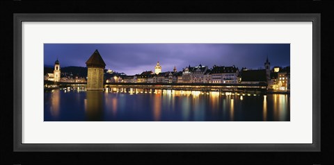 Framed Buildings lit up at dusk, Chapel Bridge, Reuss River, Lucerne, Switzerland Print