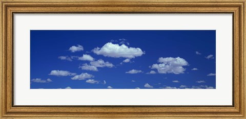 Framed Clouds against a deep blue sky Print