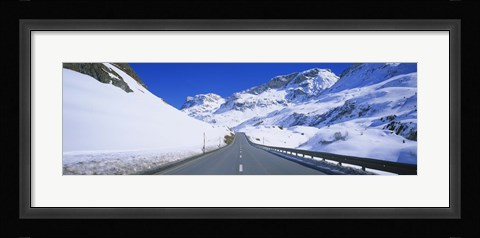 Framed Empty road passing through a polar landscape, Route 3, Graubunden, Switzerland Print