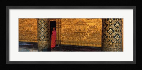 Framed Monk in prayer hall at Wat Mai Buddhist Monastery, Luang Prabang, Laos Print