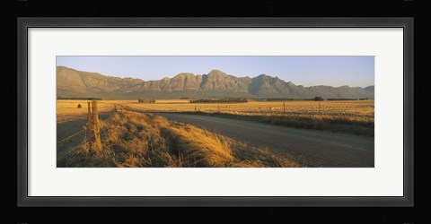 Framed Road running through a farm, South Africa Print