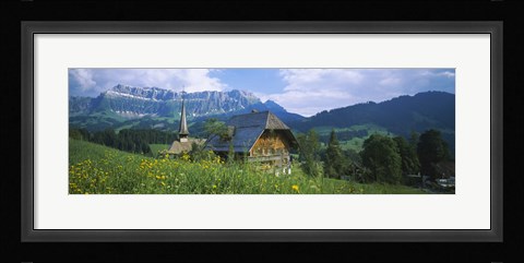 Framed Chalet and a church on a landscape, Emmental, Switzerland Print