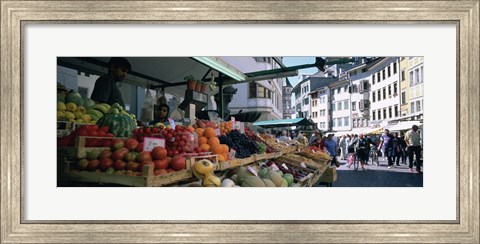 Framed Group of people in a street market, Lake Garda, Italy Print