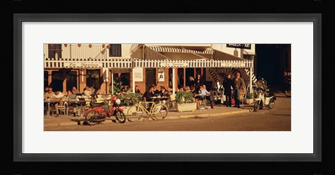 Framed Tourists sitting in a cafe, Sitges Beach, Catalonia, Spain Print