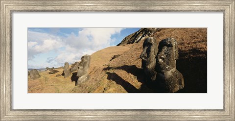 Framed Low angle view of Moai statues, Tahai Archaeological Site, Rano Raraku, Easter Island, Chile Print