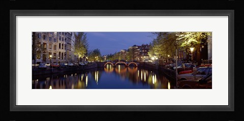 Framed Night View Along Canal Amsterdam The Netherlands Print