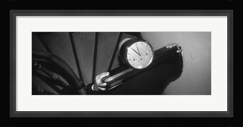 Framed Man Carrying Clock Up Stairs On Shoulders Print