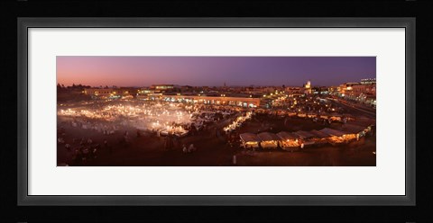 Framed High angle view of a market lit up at dusk, Djemaa El Fna, Medina Quarter, Marrakesh, Morocco Print