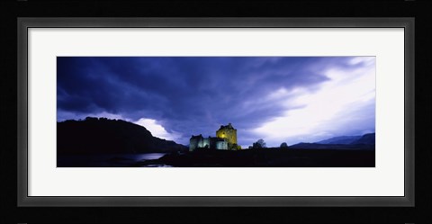Framed Low Angle View Of A Castle Lit Up At Dusk, Eilean Donan Castle, Highlands, Scotland, United Kingdom Print