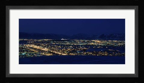 Framed High angle view of city lit up at night, Reykjavik, Iceland Print