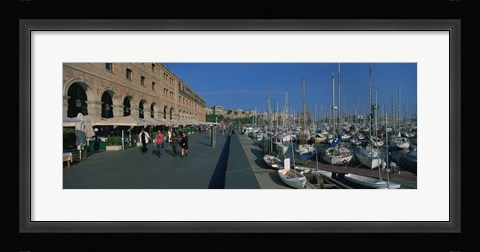 Framed Pedestrian walkway along a harbor, Barcelona, Catalonia, Spain Print