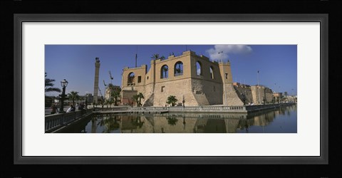 Framed Reflection of a building in a pond, Assai Al-Hamra, Tripoli, Libya Print