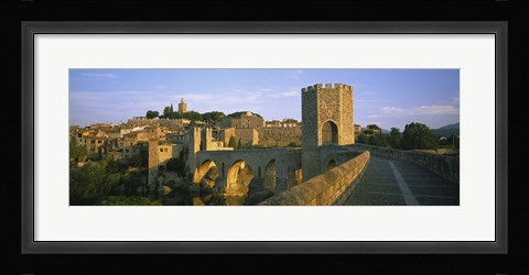 Framed Footbridge across a river in front of a city, Besalu, Catalonia, Spain Print
