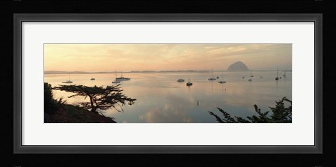 Framed Boats in a bay with Morro Rock in the distance, Morro Bay, San Luis Obispo, California, USA Print