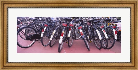 Framed Bicycles parked in a parking lot, Amsterdam, Netherlands Print