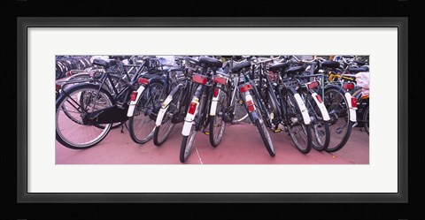 Framed Bicycles parked in a parking lot, Amsterdam, Netherlands Print