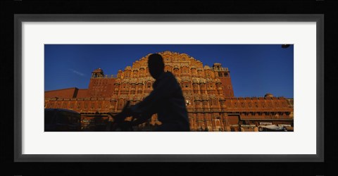 Framed Silhouette of a person riding a motorcycle in front of a palace, Hawa Mahal, Jaipur, Rajasthan, India Print