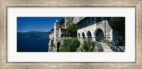 Framed Walkway along a building at a lake, Santa Caterina del Sasso, Lake Maggiore, Piedmont, Italy Print